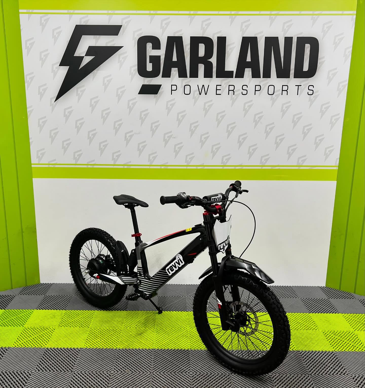 Standard Revvi 20 electric bike photographed in the Garland Powersports showroom