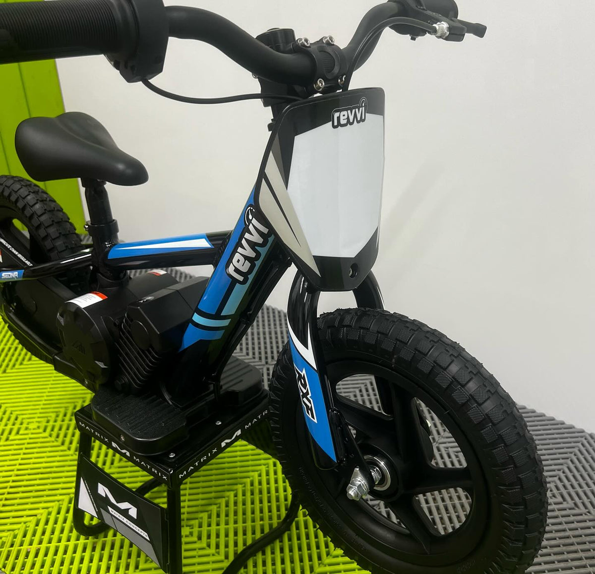 Revvi 12 Electric Bike, Stabilisers & Helmet Bundle – Blue