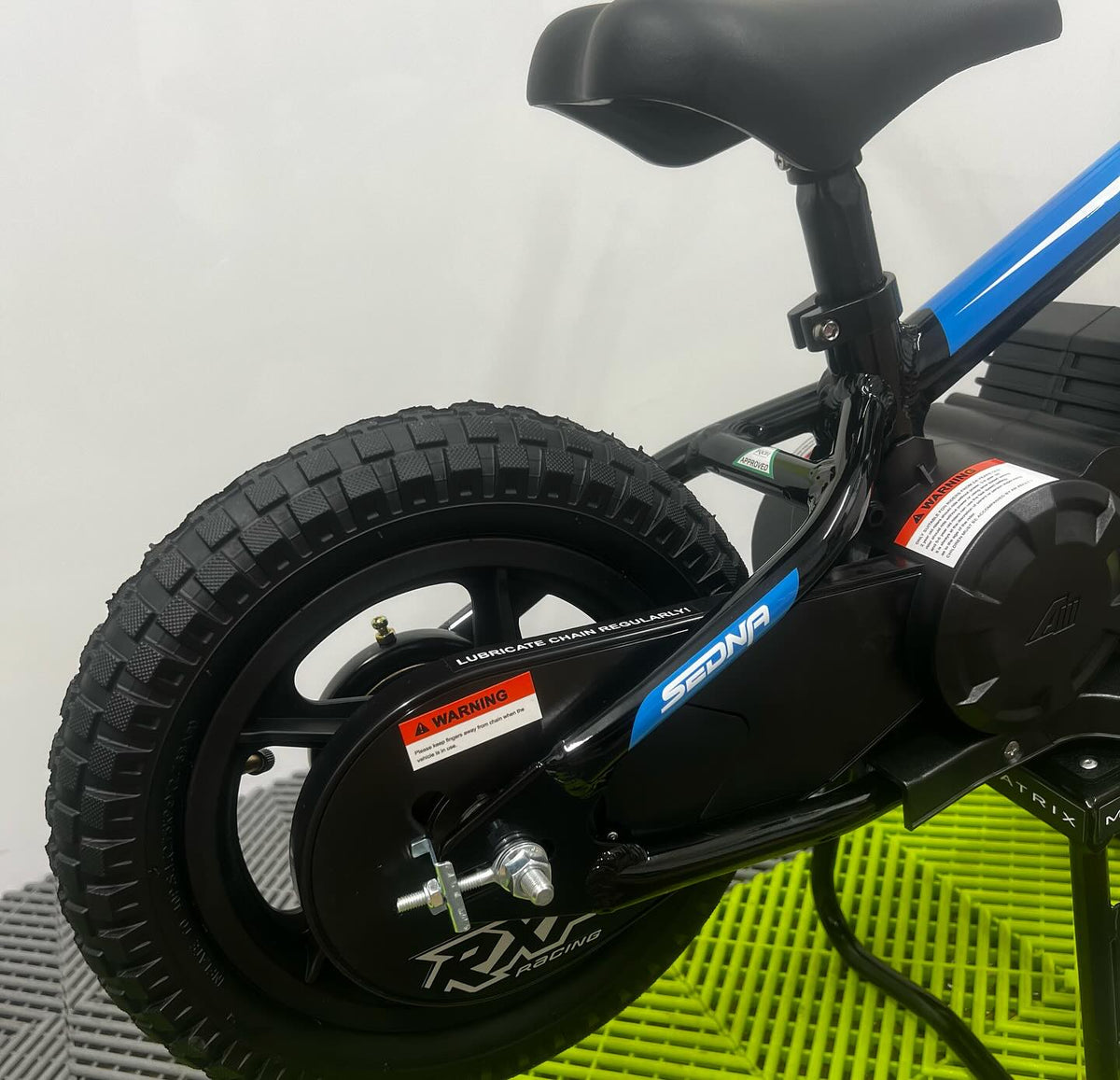 Revvi 12 Electric Bike, Stabilisers & Helmet Bundle – Blue