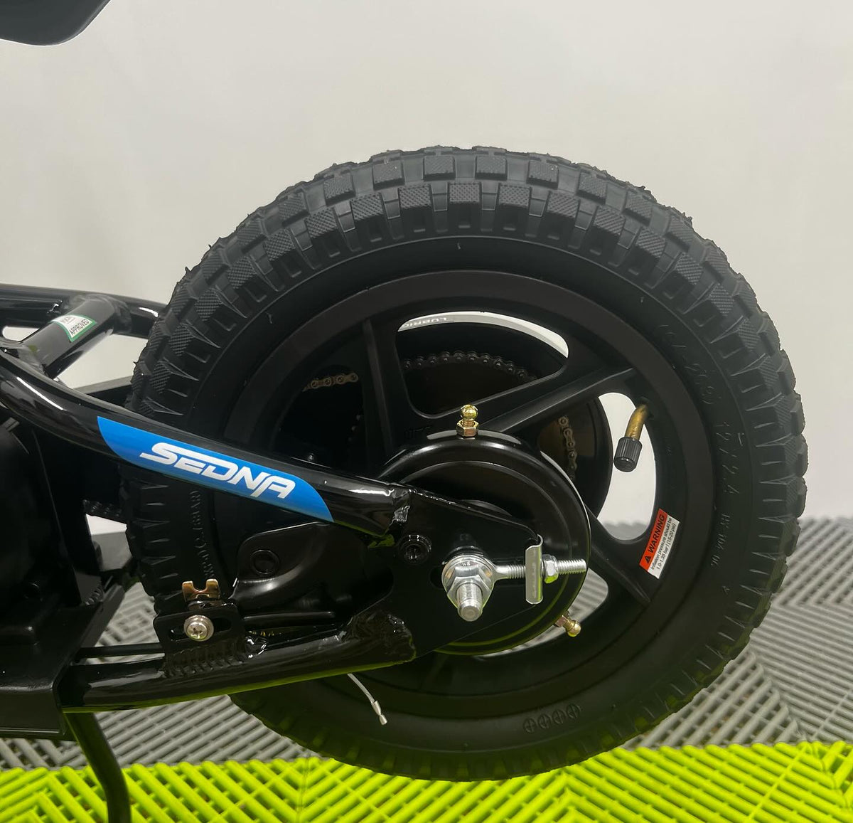 Revvi 12 Electric Bike, Stabilisers & Helmet Bundle – Blue