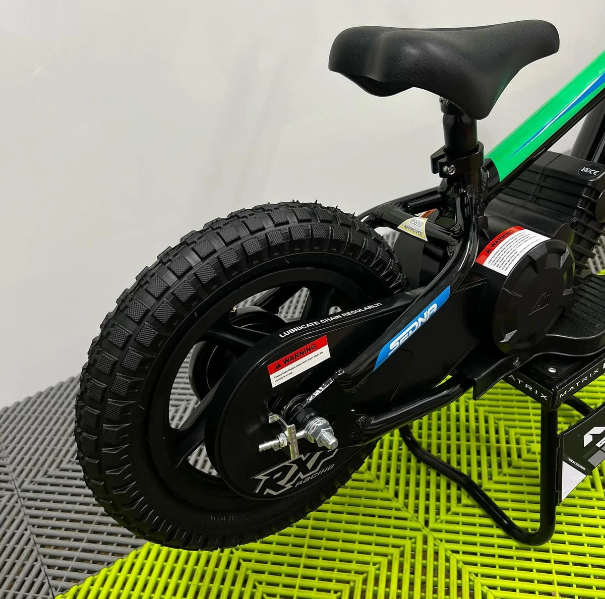 Revvi 12 Electric Bike, Stabilisers & Helmet Bundle – Green