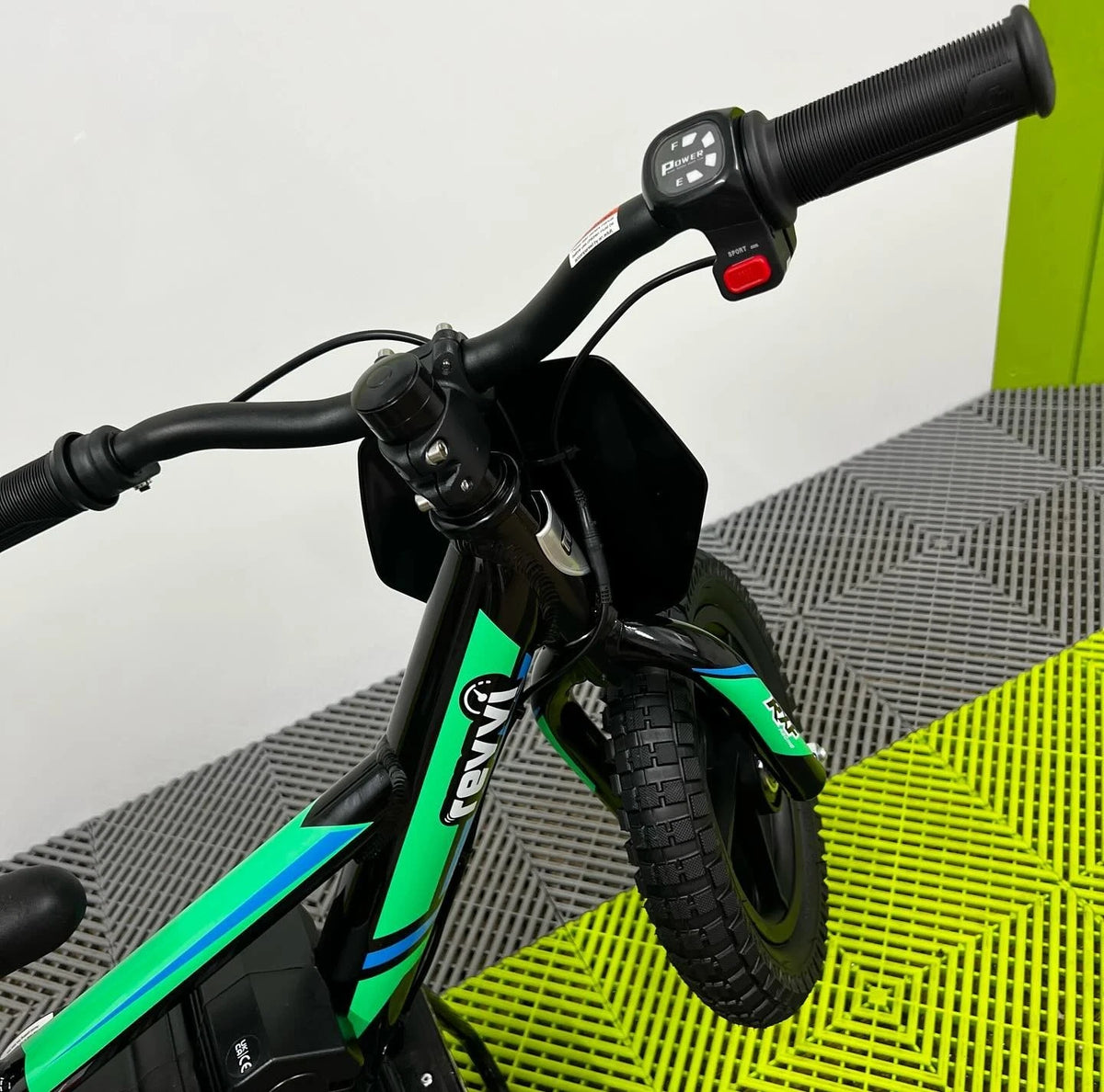 Revvi 12 Electric Bike, Stabilisers & Helmet Bundle – Green