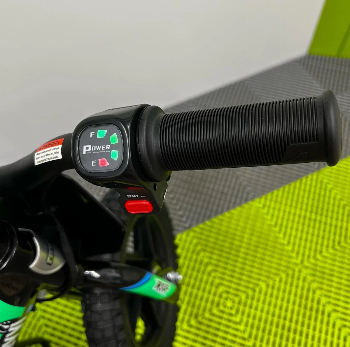 Revvi 12 Electric Bike, Stabilisers & Helmet Bundle – Green