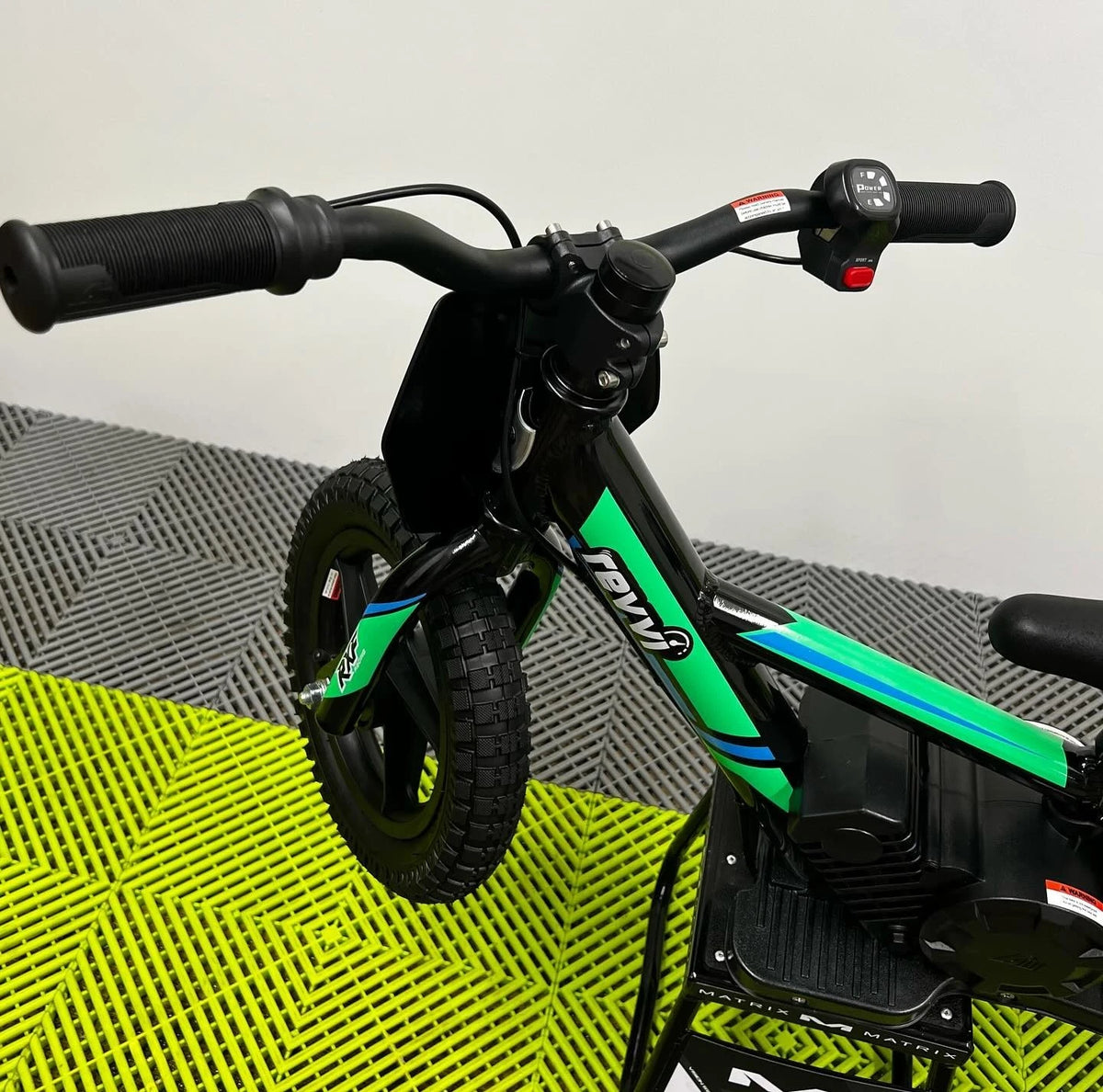 Revvi 12 Electric Bike, Stabilisers & Helmet Bundle – Green