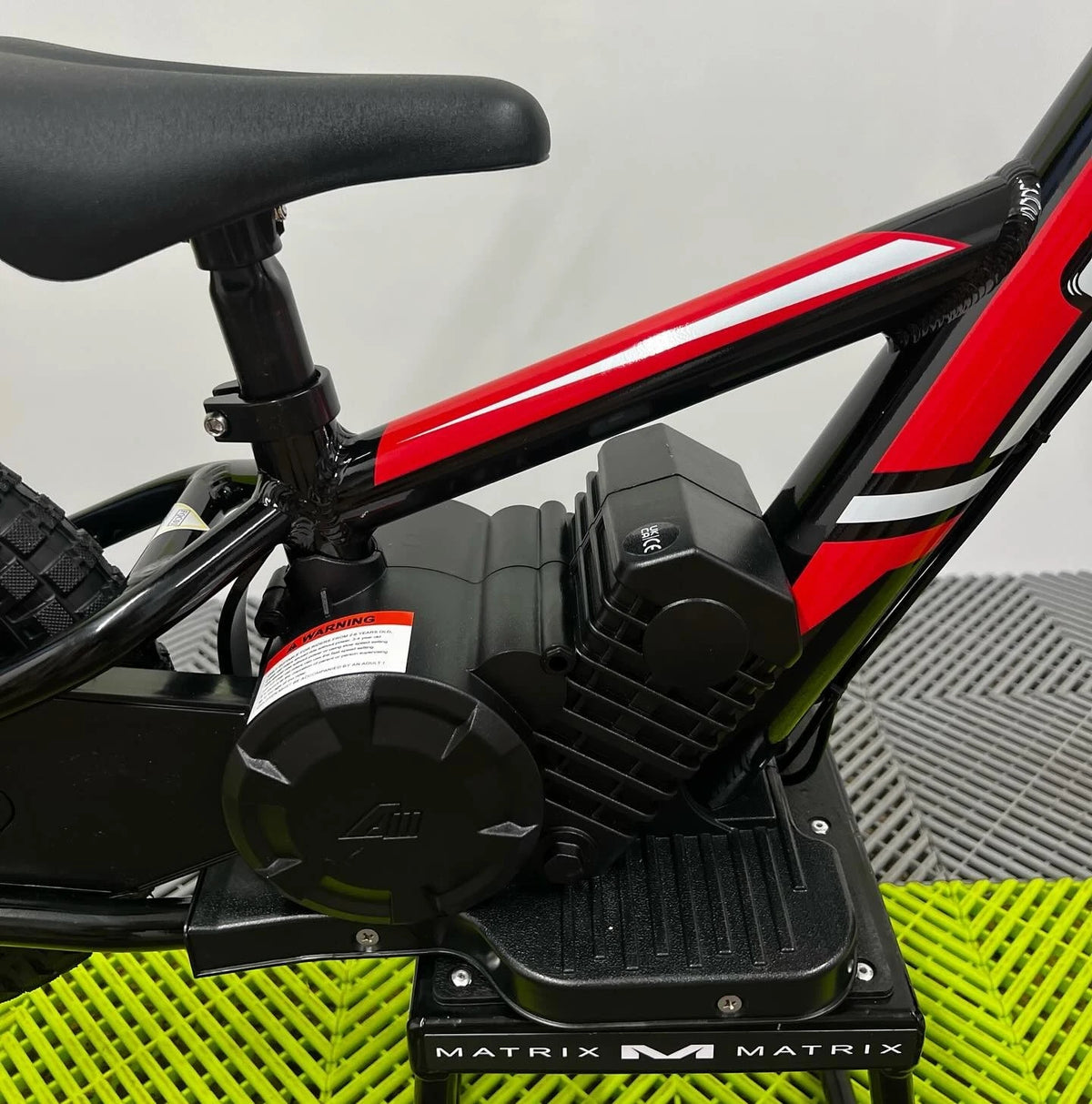 Revvi 12 Electric Bike, Stabilisers & Helmet Bundle – Red